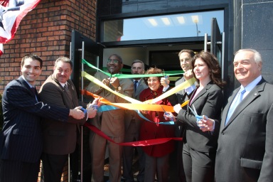 Queens politicians cut the ribbon of the Howard Beach NYFAC center at the grand opening. Photo by Liam La Guerre/LFRAG.